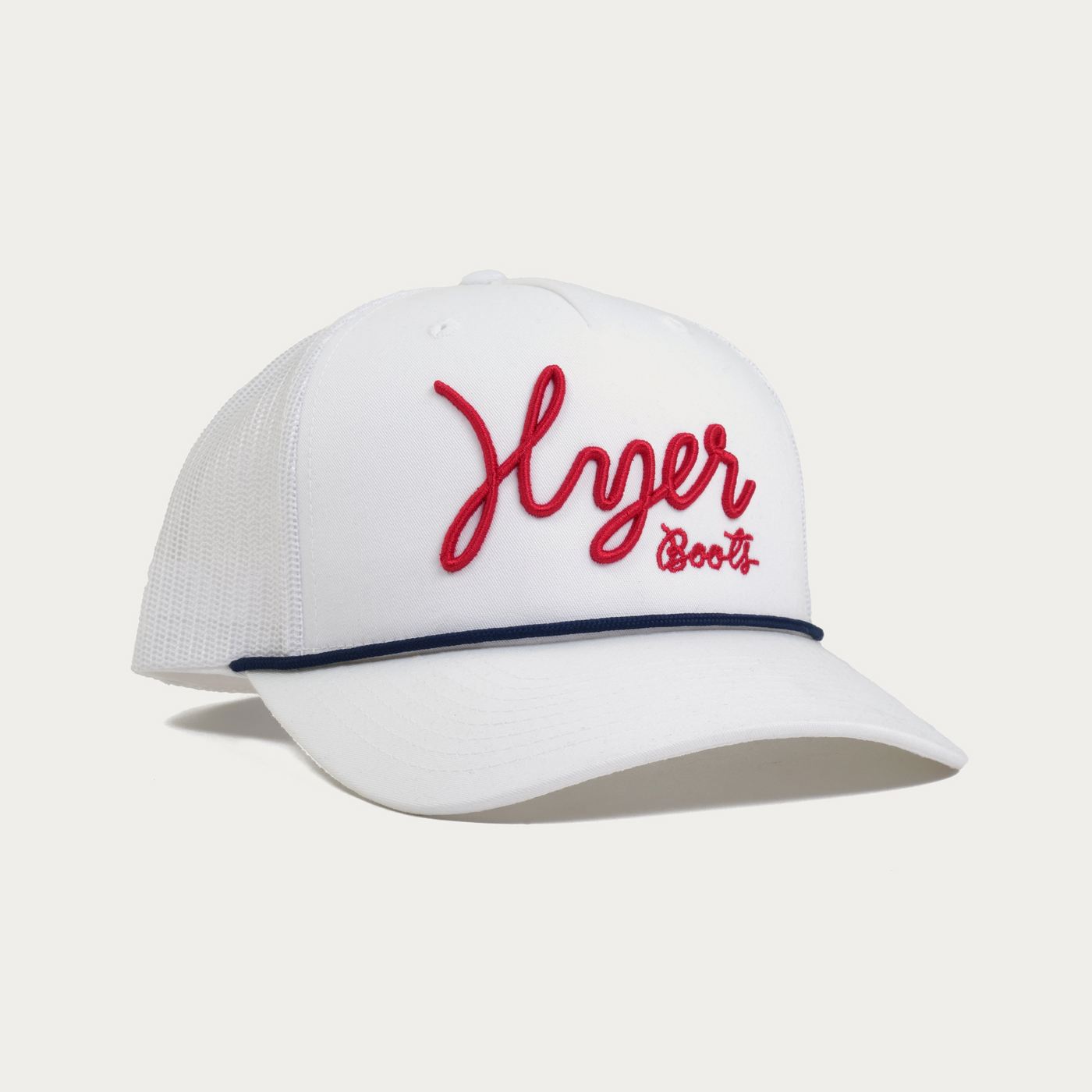 A white trucker-style baseball cap with a curved brim, featuring red embroidered script text reading 'Hyer Boots' on the front panel and a thin black piping accent along the edge of the brim.