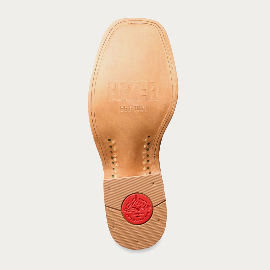 Tan shoe sole with 'Hyer Boots' branding on a light gray background