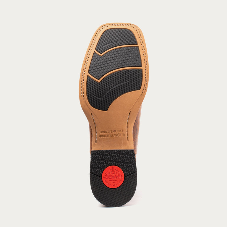 Close-up of a shoe sole with brand logo on a light gray background