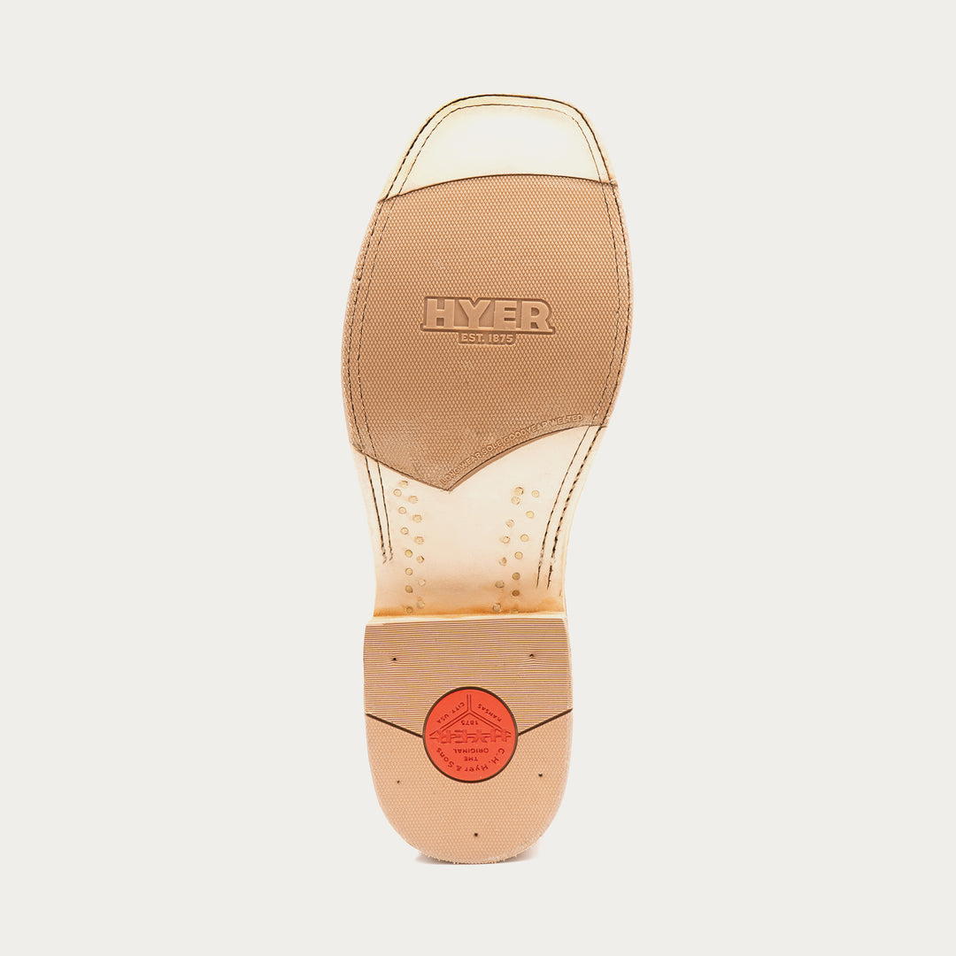 Tan shoe insole with 'HYER' branding on a light gray background