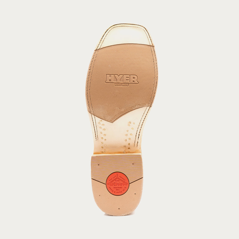 Tan shoe insole with 'HYER' branding on a light gray background