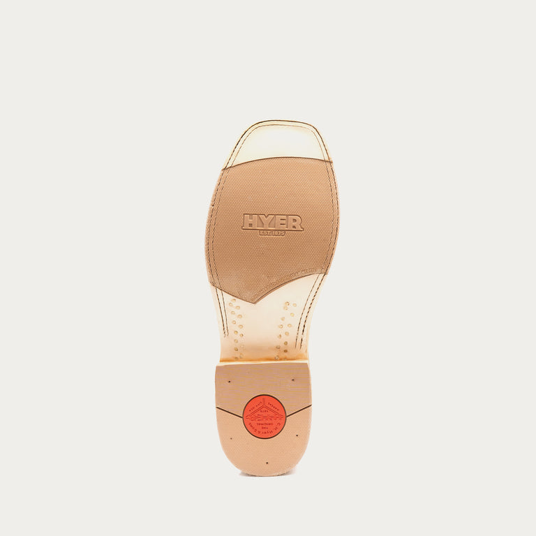 Tan shoe sole with HYER branding on a light gray background