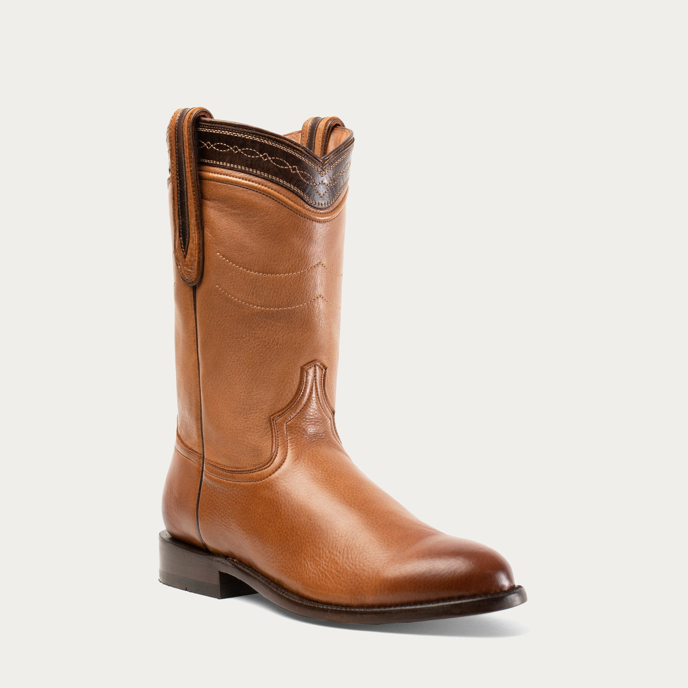 A brown, smooth leather boot with a round toe and a low heel, characteristic of a classic cowboy boot.