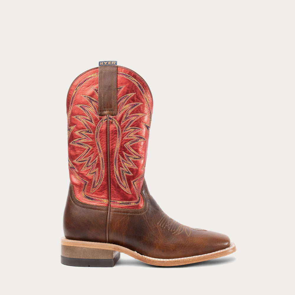 Brown and red cowboy boot on a white background