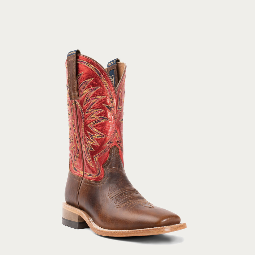 Brown cowboy boot with red shaft on a white background