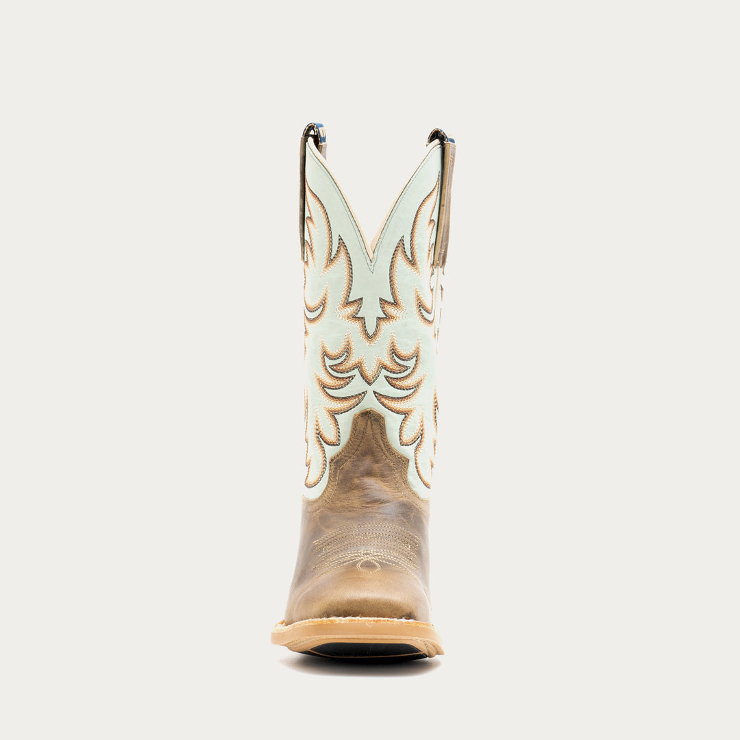 Brown and light blue cowboy boot with tan and brown embroidery on a light gray background