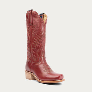 Red cowboy boot with intricate designs on a light gray background