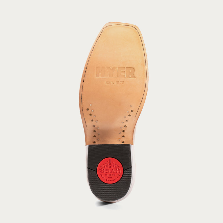 Shoe sole with HYER branding on a light gray background