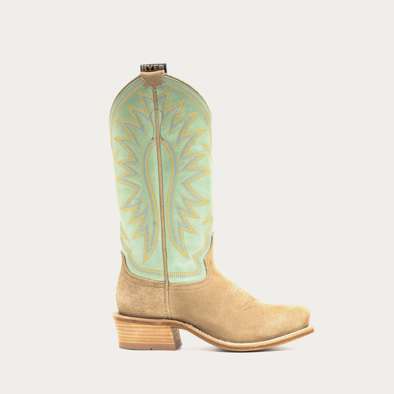 Tan and light green cowboy boot with green embroidered top on a gray background