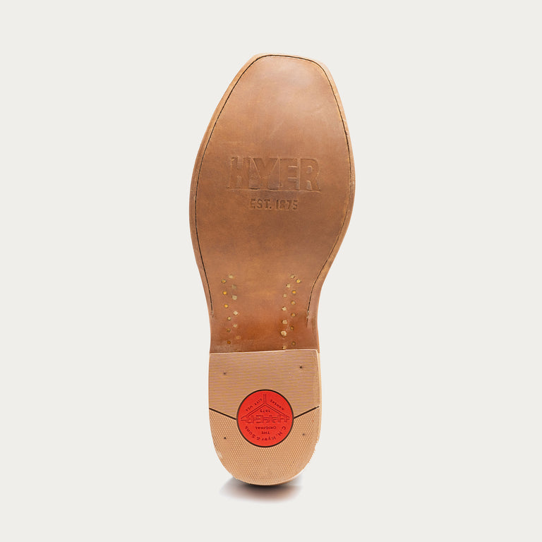 Brown leather shoe sole with 'Hyer' branding on a light gray background