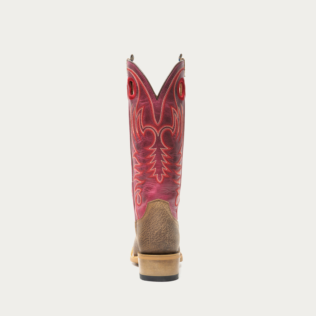 Brown and dark pink cowboy boot with a brown sole on a light gray background