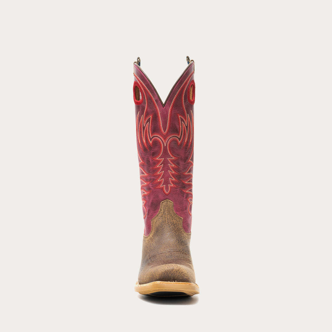 Brown and dark pink cowboy boot on a light gray background