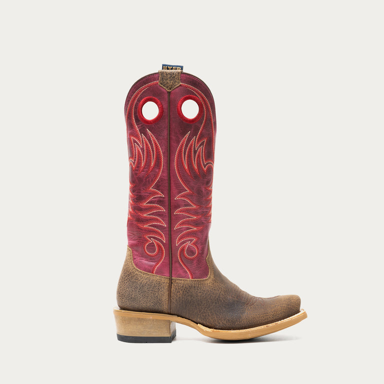 Brown and dark pink cowboy boot on a light gray background
