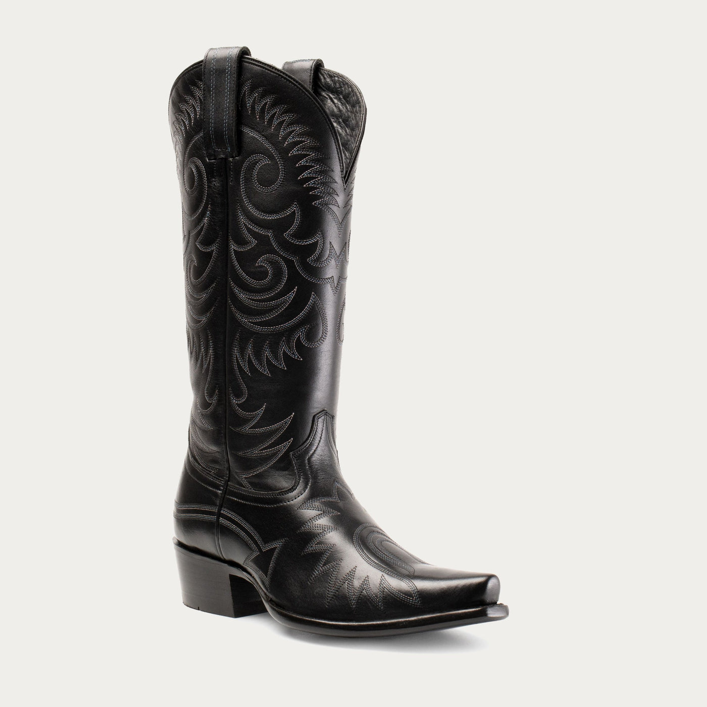 A black leather cowboy boot with full-boot embroidery and a sharp snip toe.