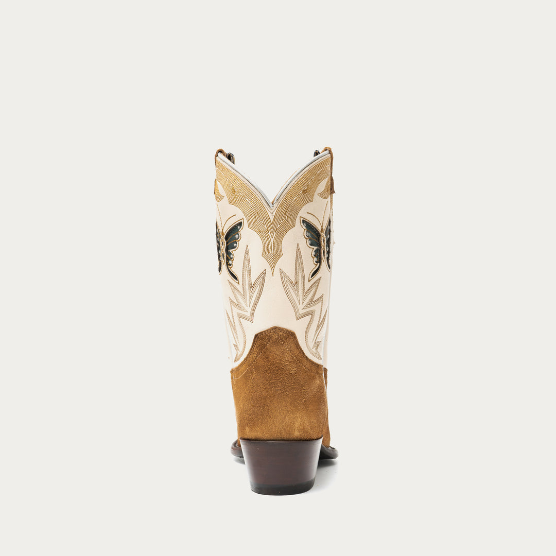 Brown and white cowboy boot with intricate stitching details and butterfly inlays on a light gray background