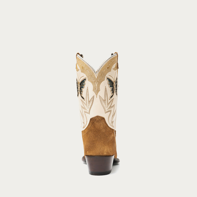 Brown and white cowboy boot with intricate stitching details and butterfly inlays on a light gray background