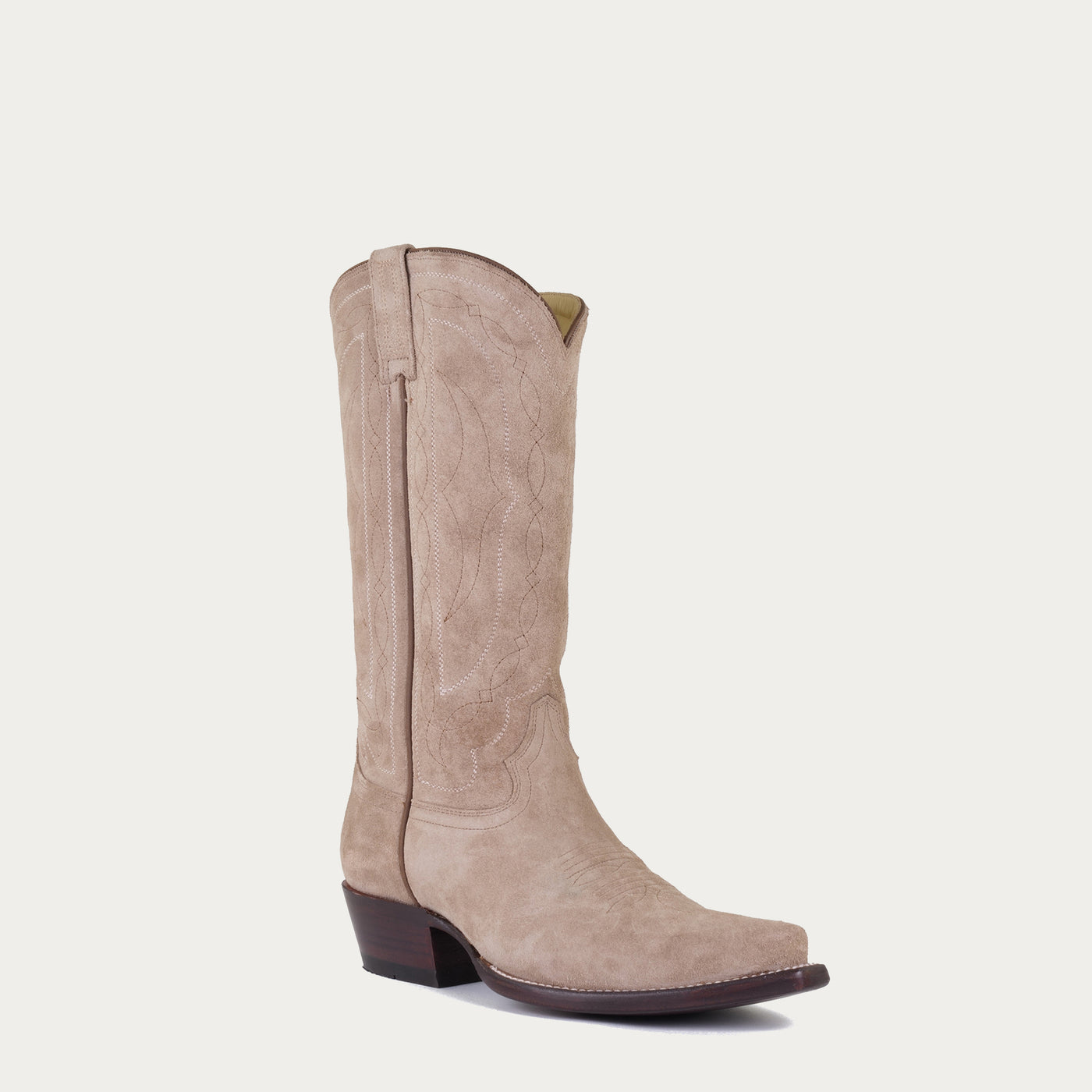 Beige tan roughout cowboy boot on a light gray background