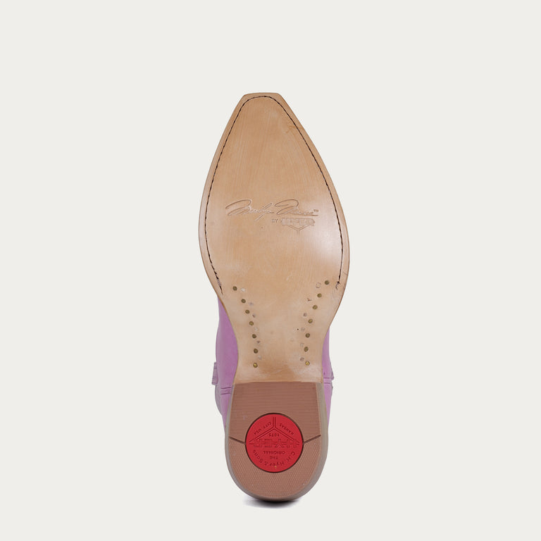 Close-up of a shoe sole with a visible brand logo on a white background