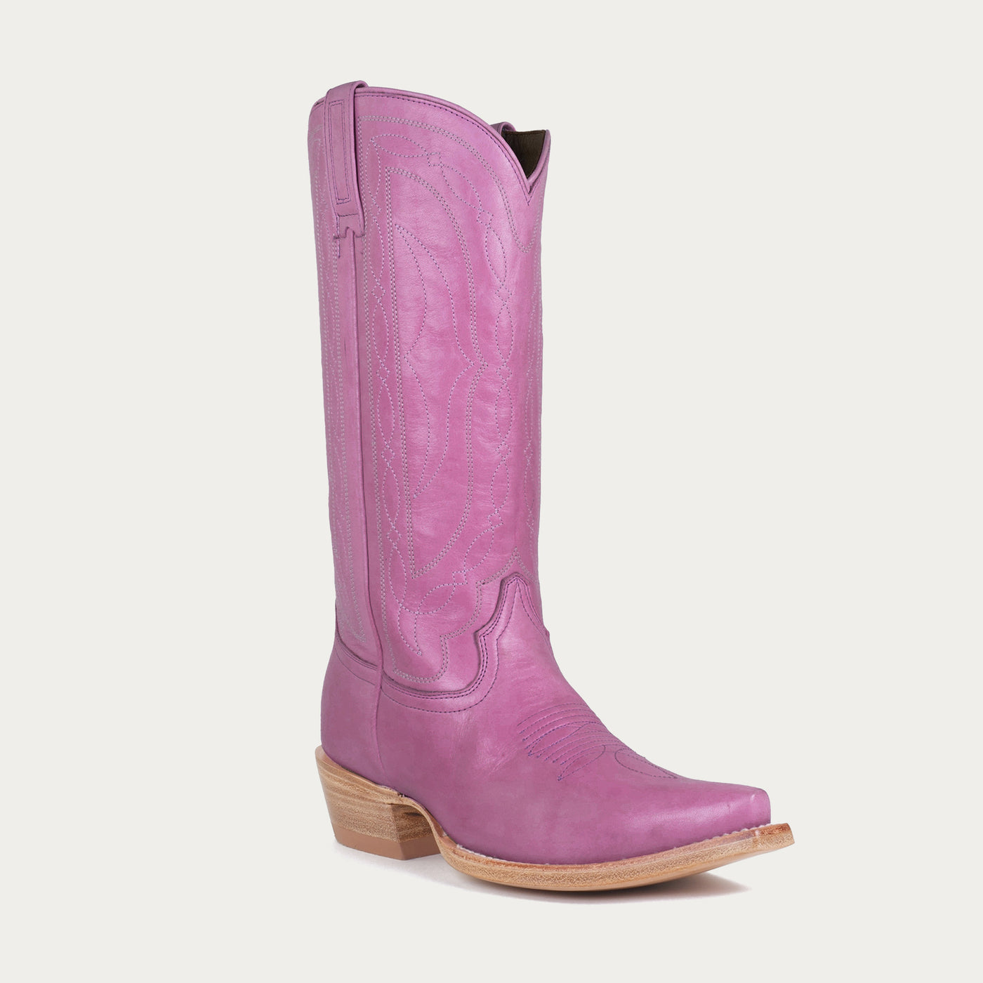 Pink cowboy boot on a white background