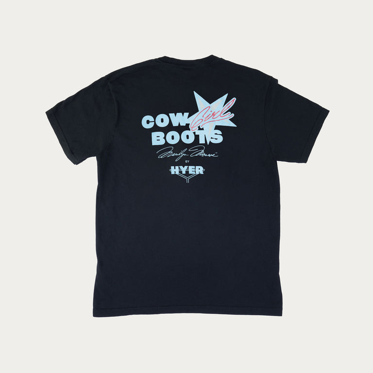 Back of black short sleeve crew neck short sleeve t-shirt with blue and red graphic print with the text "CowGirl Boots Marilyn Monroe x Hyer"